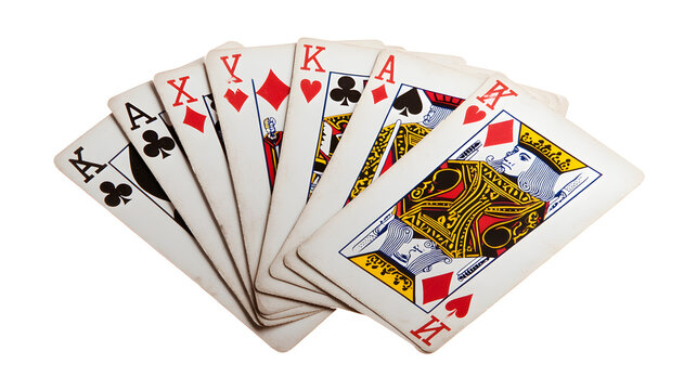 Classic playing cards fan spread showcasing ace through king suits in bright lighting with cards featuring distinct studio lighting against plain white background displays fan
