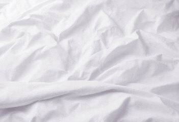 Obraz premium White fabric texture with soft folds and wrinkles