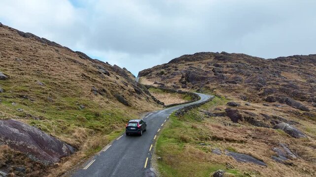 Ireland Epic Locations car driving to the top of the Healey Pass from the Kerry side epic road trips in The Wild Atlantic Way