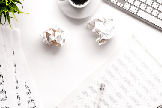 coffee with paper note in music studio for dj or musician work on white background top view mock-up