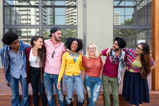 Diverse friends enjoying outdoor gathering.