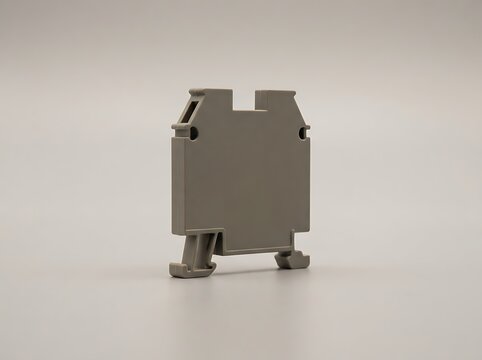 Gray plastic electrical terminal connector isolated on white