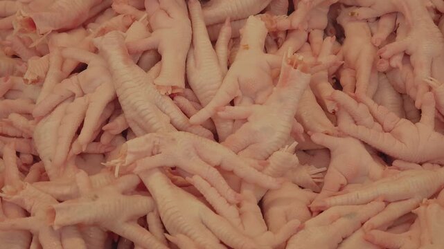 Fresh chicken feet sold in supermarkets