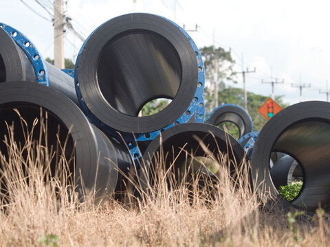 High-density polyethylene (HDPE) or steel pipes are used for high-pressure water supply these blue, flanged and bolted pipes are installed both above and below ground.