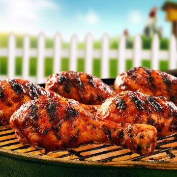 Grilled Chicken Drumsticks on BBQ Grill Outdoor