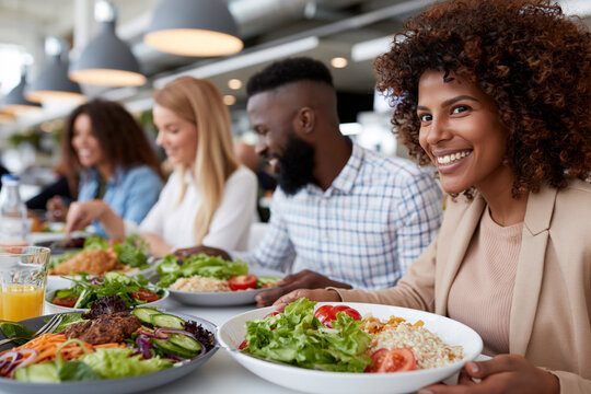Group enjoys a meal together at a busy restaurant