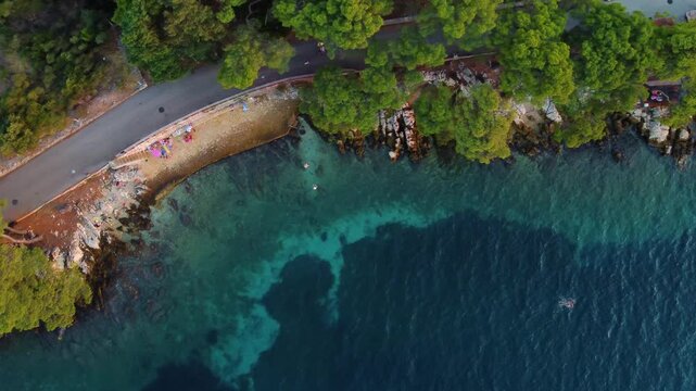Aerial top down view of lanterna beach on hvar island croatia