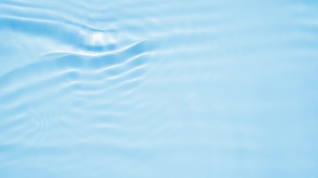 Abstract transparent water shadow surface texture natural ripple on blue background