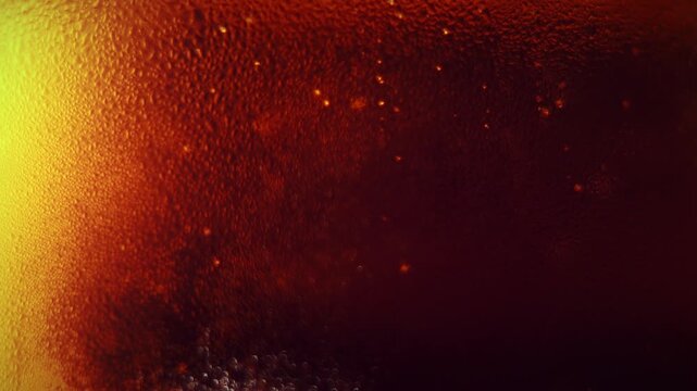 Fizzy Bubbles in a Glass with Warm Orange Glow, Macro