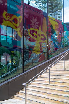 Colorful cultural wall mural along the outdoor steps at Mitsui Shopping Park LaLaport BBCC overlooking city high-rises on September 8, 2026 in Kuala Lumpur, Malaysia.