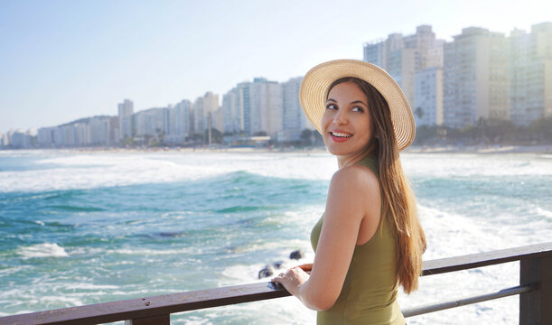 Brazilian girl on promenade viewpoint in Guaruja coastal city of Brazil, South America