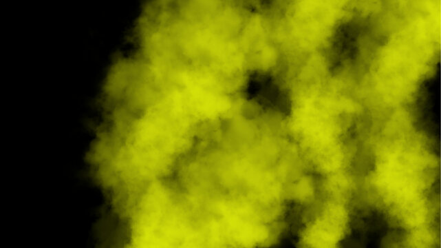 Abstract yellow smoke explosion on black background	