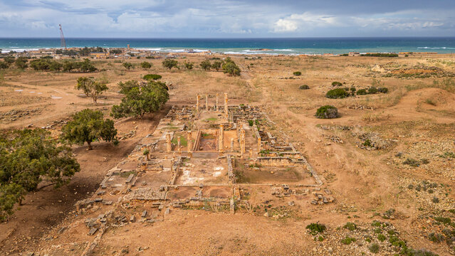 Ruins of ancient Greek city Ptolemais with coastline in the background in Eastern Libya
