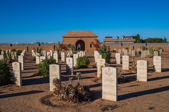 British World War 2 cemetery located in Tobruk, Eastern Libya with rows of gravestones and a central structure