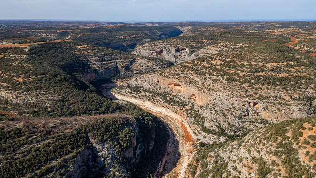 Exploring the landscape of Wadi al Kuf in eastern Libya with its deep gorge and winding river