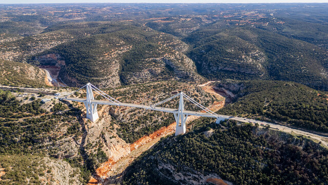 Huge bridge spans Wadi al Kuf Gorge in Eastern Libya showcasing modern engineering across rugged terrain