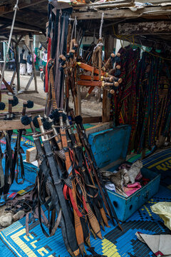 Swords displayed for sale in a market in Port Sudan, Sudan attracting attention from local customers