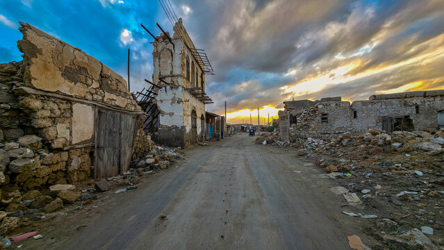 Suakin Island shows historic ruins and roads during sunset with a backdrop of clouds in Sudan