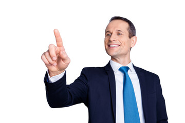 Obraz premium Cheerful, corporate, executive man in formal wear with tie having invisible screen, trying to touch a button with forefinger in front of him, standing over gray background