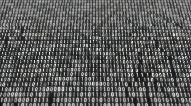 Infinite rows of glowing white binary code on dark background