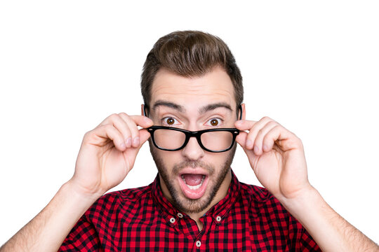 Wow! Close up portrait of handsome attractive curious cunning joyful funny amazed surprised cheerful guy with bristle dressed in red casual checkered shirt, isolated on gray background