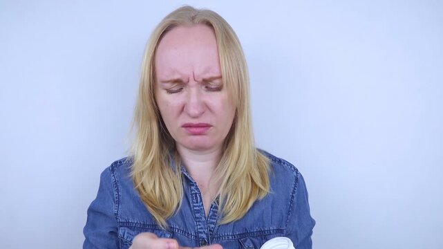 Woman suffering from phagophobia struggling to swallow a pill. Anxious female holding a medicine bottle, feeling fear, stress and difficulty swallowing medication.