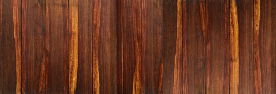 Holz Hintergrund - dunkelbraune vertikale Bretterwand mit Maserung und einigen hellen Nuancen