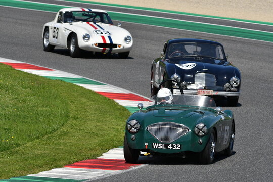 Scarperia, Italy - April 5th 2024: Austin-Healey 100 BN1 1954 drive by unknown in action during Mugello Classic 2024 at Mugello Circuit in Italy.