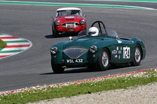 Scarperia, Italy - April 5th 2024: Austin-Healey 100 BN1 1954 drive by unknown in action during Mugello Classic 2024 at Mugello Circuit in Italy.