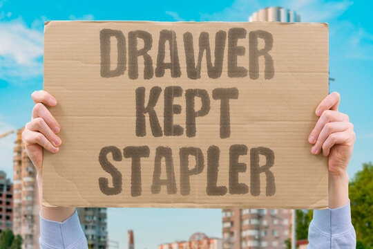 "Drawer Kept Stapler" The desk cabinet stored the tool. DRAWER.KEPT.STAPLER.CABINET.TOOL.