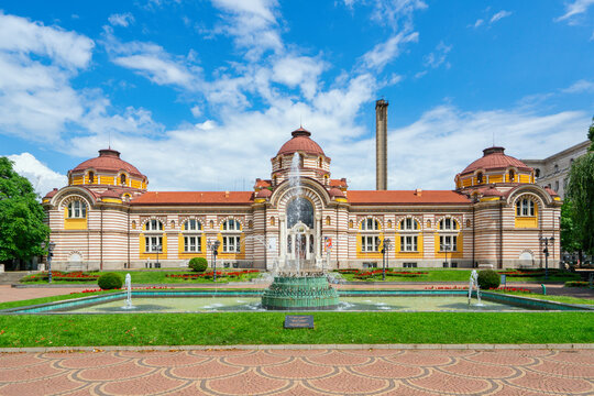 Sofia Central Mineral Baths features dome roofs and a fountain in a public space in Sofia Bulgaria