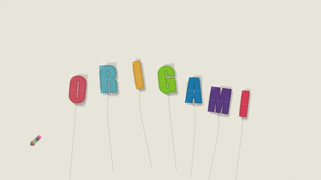 Origami word made of colorful paper letters hanging on strings floating