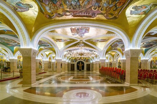 Interior of Saint Sava temple crypt featuring mosaics and art in Belgrade, Serbia