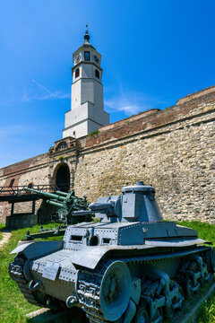 Old tank and cannon displayed at Belgrade fortress near Sahat Kula clock tower in Serbia