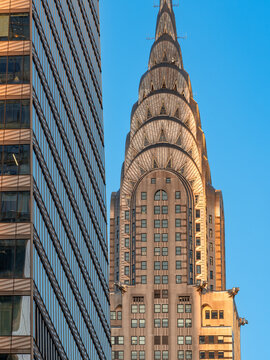 New York City, NY, USA &ndash; July 2, 2026: Steel-clad crown of the Art Deco Chrysler Building in late-day sunlight in Midtown Manhattan