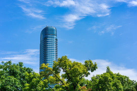 Modern Kula Belgrade skyscraper reflects blue sky in vibrant urban setting of Belgrade