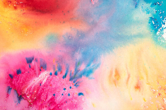 A vibrant and colourful watercolour abstract painting on canvas painted with wild and free brush strokes