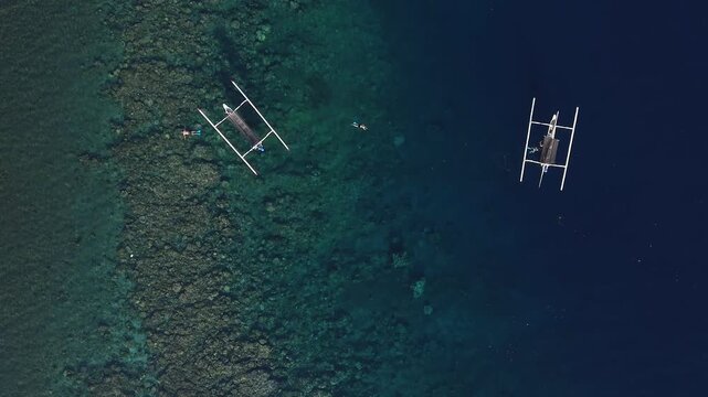 Aerial Drone View Traditional Balinese Jukung Boats Over Coral Reef Ocean Amed.