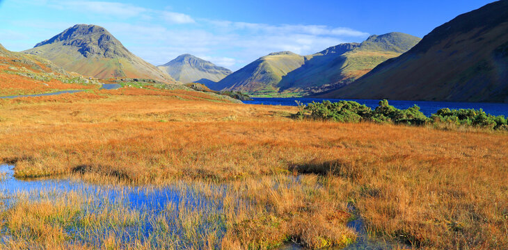 Views of Great Gable and Kirk Fell over Wastwater in Lake District during clear blue sky