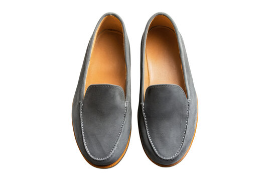 Pair of Light Beige and Dark Gray Suede Slip On Loafers on Black Background shoes footwear