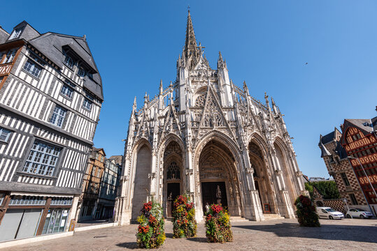 Flamboyant Gothic facade of church Saint-Maclou stands tall in Rouen, showcasing architectural details on a clear day