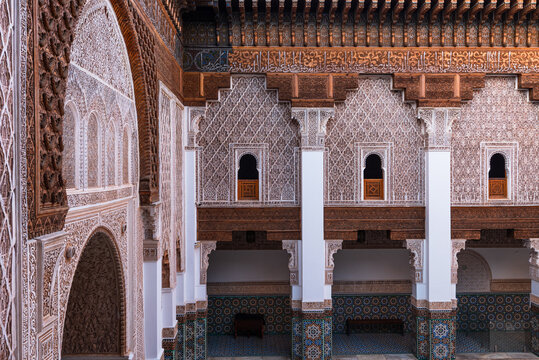 Exploration of the architectural design in the courtyard of Ben Youssef Madrasa in Marrakech Morocco