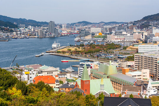 View of Nagasaki Port with Oura Church in the foreground and city landscape in the background