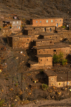 Cluster of traditional stone houses on the mountainside of the Anti-Atlas region in Morocco showcasing Berber architecture
