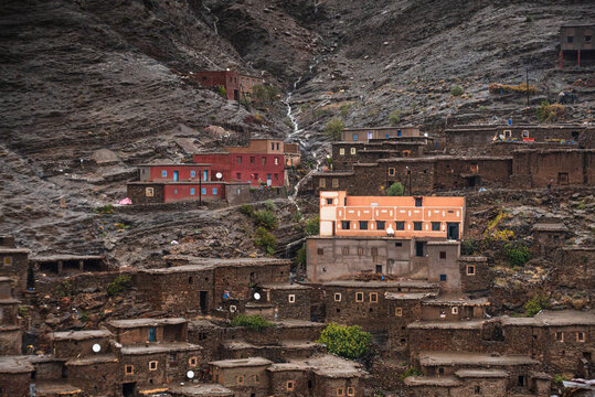 Traditional pueblo amazigh architecture in the Anti-Atlas Mountains of Morocco shows terraced homes built into rugged slopes