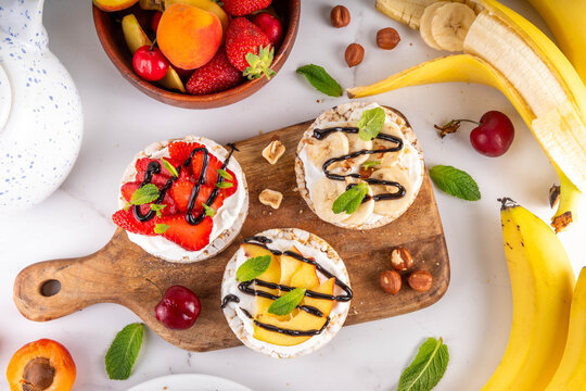 Rice Crackers Healthy diet sandwiches with fruits and berries