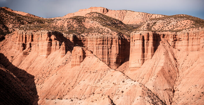 Panoramic view of Gorafe badlands showcasing erosion channels and stratified hills under Mediterranean climate in Spain