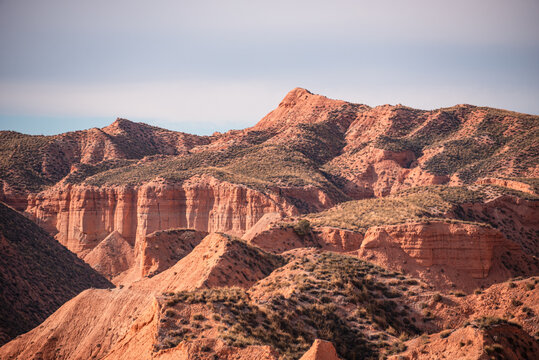 Red canyons and plateaus show geological formations in Los Colorados of Gorafe Desert, Granada Province, Andaluca, Spain