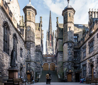 View of New College courtyard showcasing Gothic architecture and spire in Edinburgh