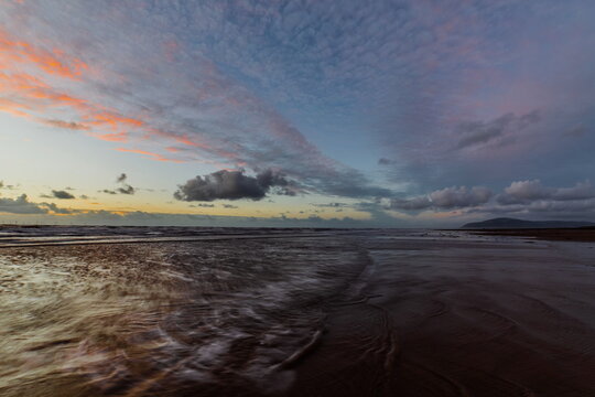 Dramatic sunset skies over coast with waves at Walney Island on 2nd November 2025
